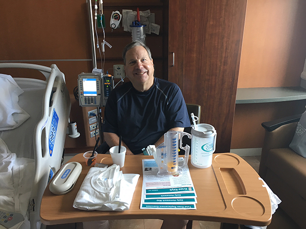 Patient noting no pain and ready for lunch! He was able to walk > 350 feet on day of surgery.